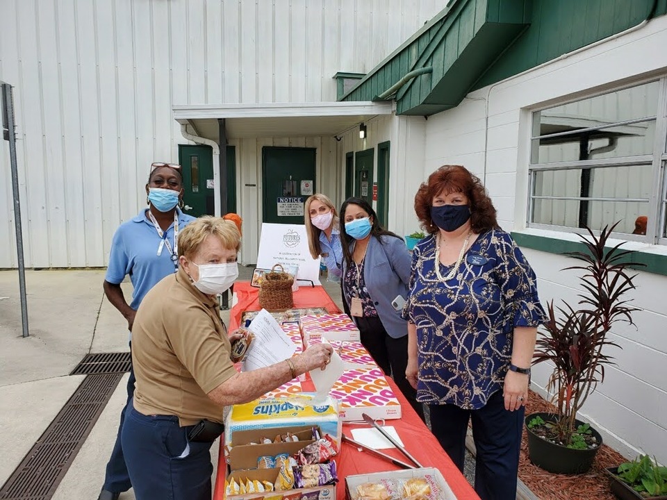 School Board Member Jamie Haynes & Supt Carmen Balgobin serving refreshments